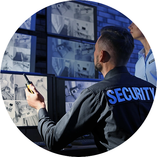 Control room operators monitoring live security feeds